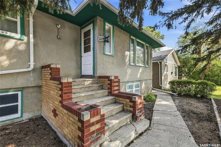 Property Photo:  309 St John Street  SK S4R 1R1 