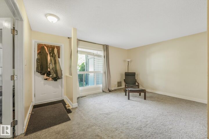 Property Photo:  2703 79 Street NW 49  AB T6K 3Z6 