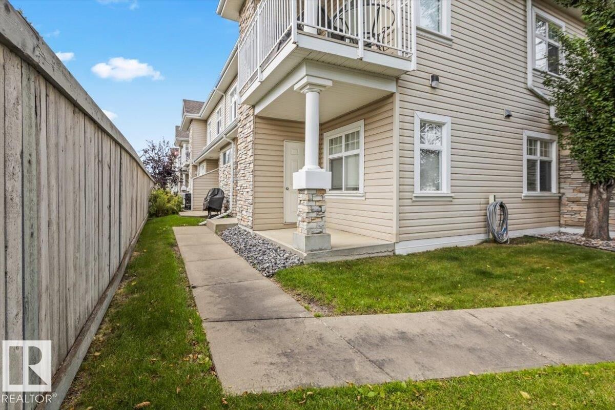Property Photo: 1179 Summerside Drive SW 1 AB T6X 1K1