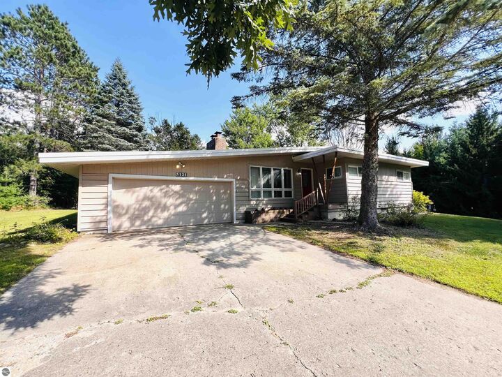 Property Photo:  5121 Crosby Road  MI 49601 