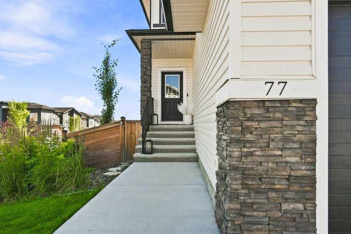 Property Photo: 77 Sage Bluff Manor NW AB T3R 0Y9