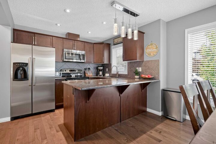 Property Photo:  3084 Windsong Boulevard SW  AB T4B 3R7 