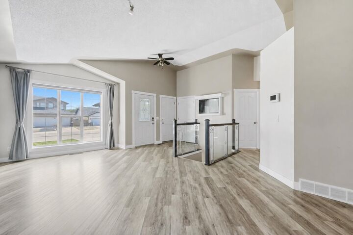 Property Photo: 206 Highwood Village Place NW AB T1V 1V9