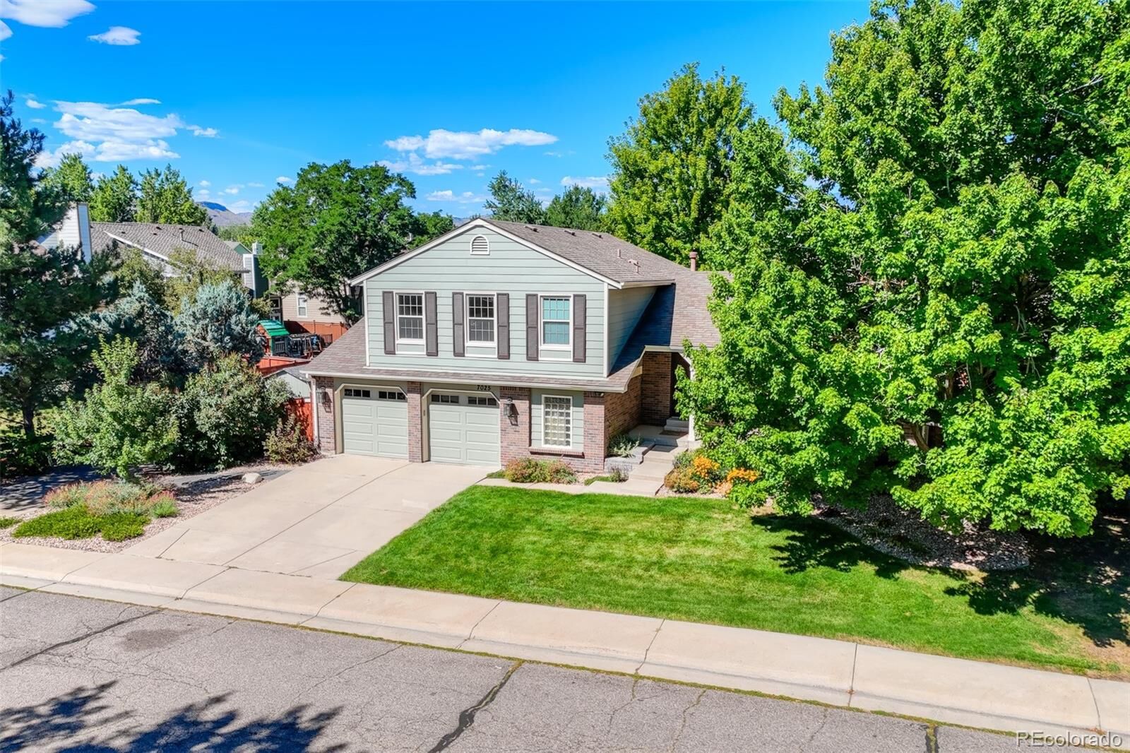 Property Photo:  7025 Gladiola Street  CO 80004 