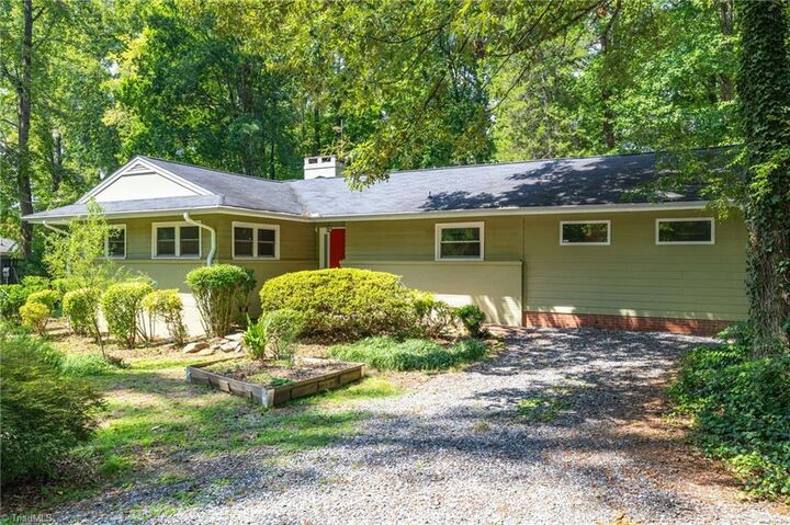 Property Photo: 909 Forest Hill Drive NC 27410