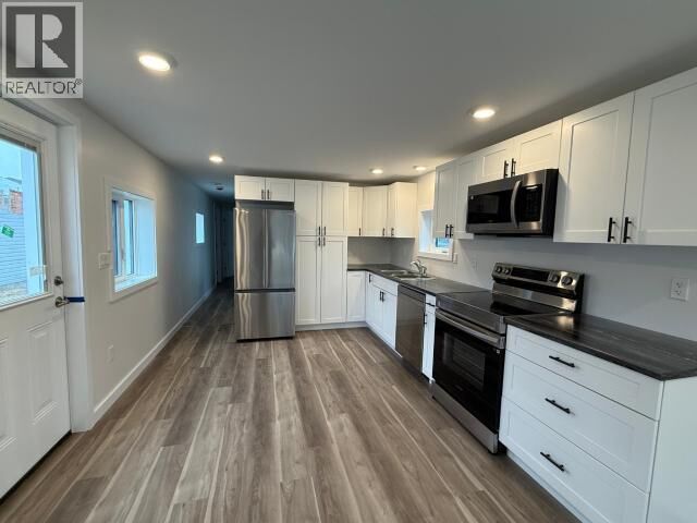 Property Photo:  36-37 Sycamore Street  YT Y1A 6E2 