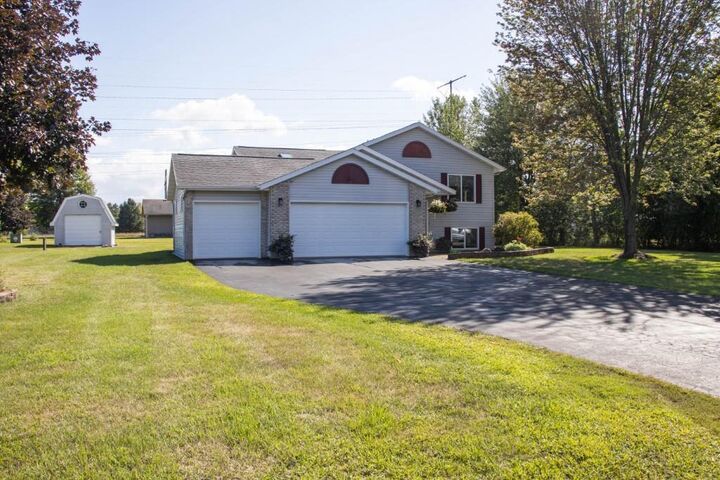 Property Photo:  307 E Industrial Park Avenue  WI 54474 