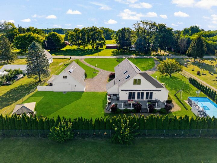 Property Photo:  59441 Romeo Plank Road  MI 48096 