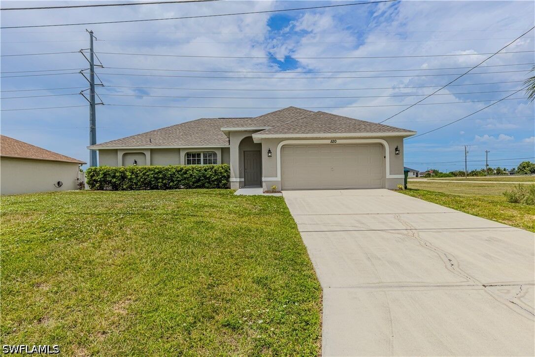Property Photo:  520 NW 24th Avenue  FL 33993 