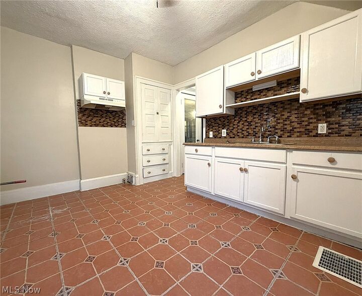 Property Photo: 12413 Saywell Avenue OH 44108