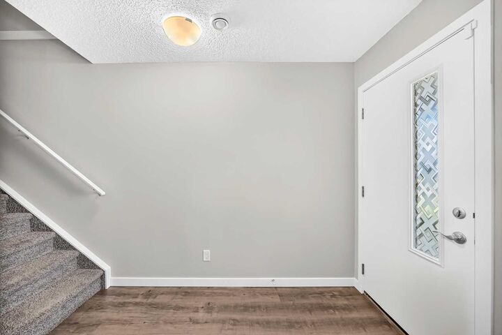 Property Photo: 301 Redstone Boulevard NE 122 AB T3N 1V7