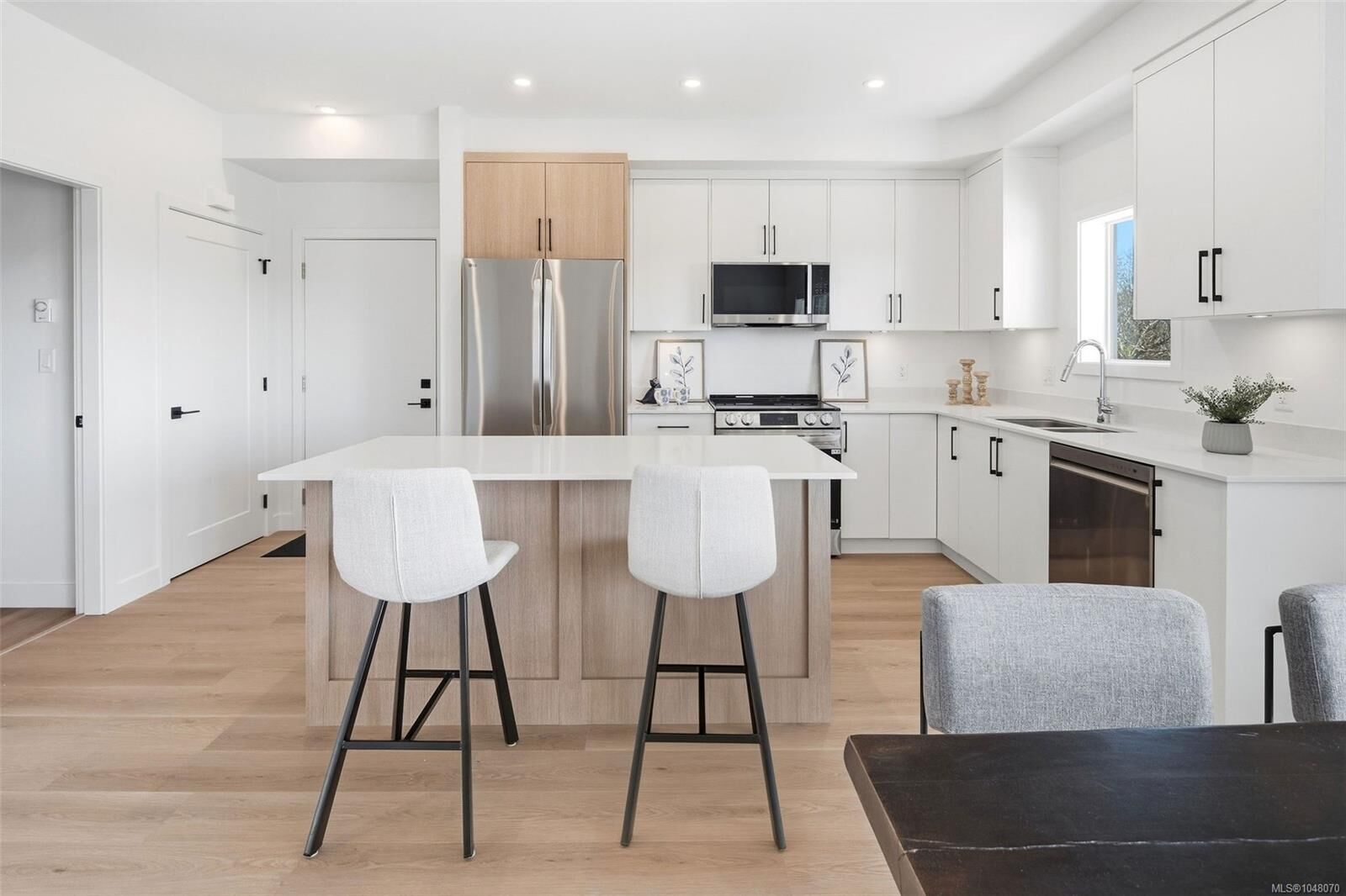 Property Photo: 7043 Central Saanich Rd #201 BC V8M 1Y3