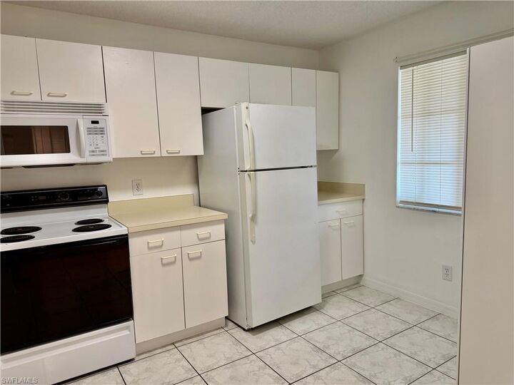Property Photo: 7755 Jewel Ln 103 FL 34109