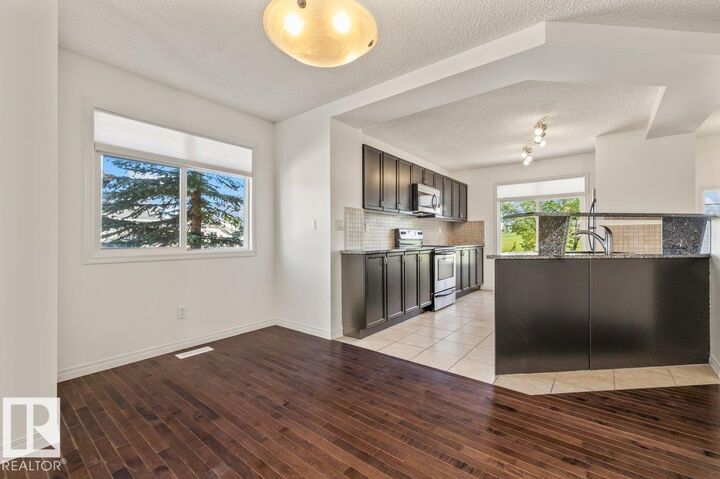 Property Photo:  1804 70 Street SW 1  AB T6X 0H4 