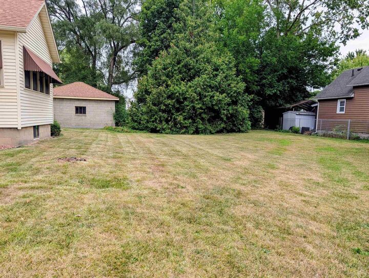 Property Photo:  1205 Wilson Street  MI 48708 