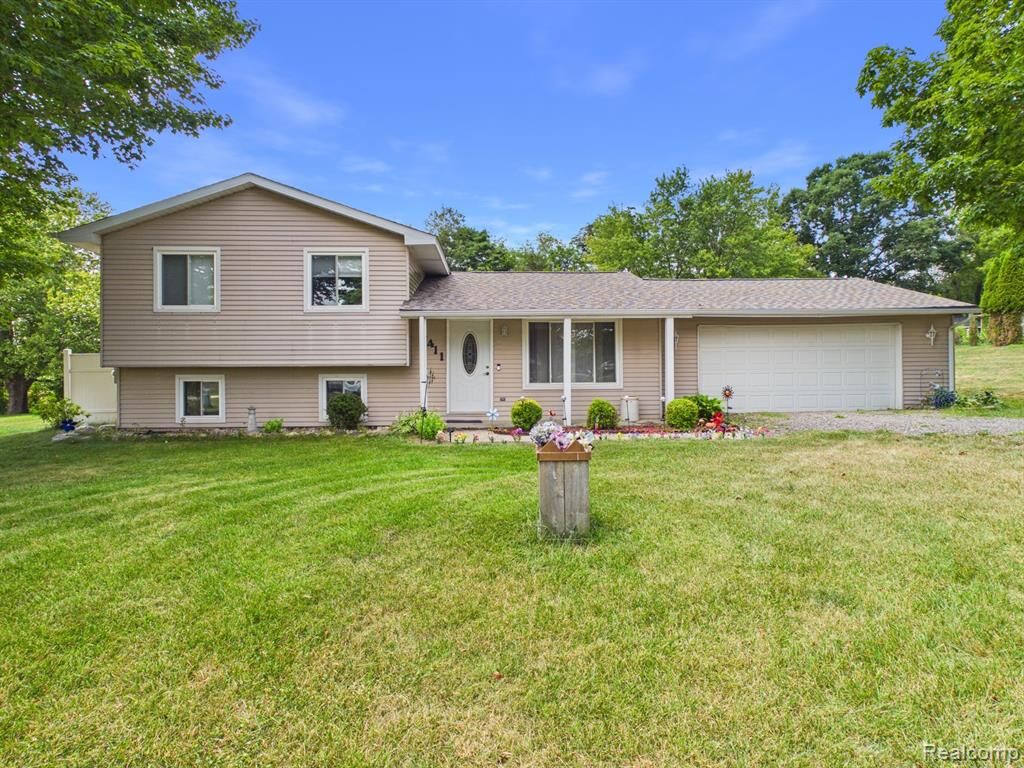 Property Photo: 4411 Huckleberry Circle MI 48421 9703