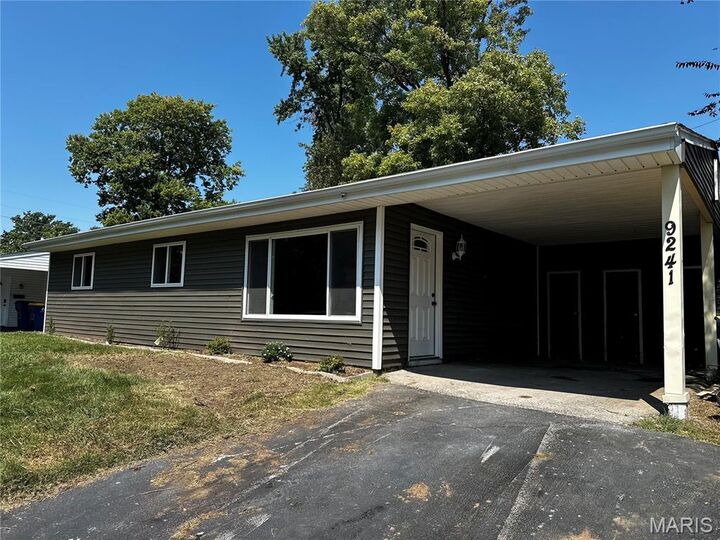 Property Photo:  9241 Harold Drive  MO 63134 