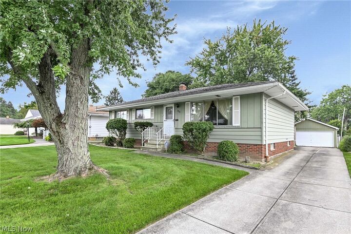 Property Photo:  7704 Howard Street  OH 44134 