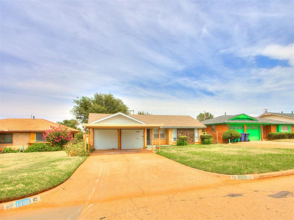 Property Photo:  1205 E Madison Street  OK 73111 