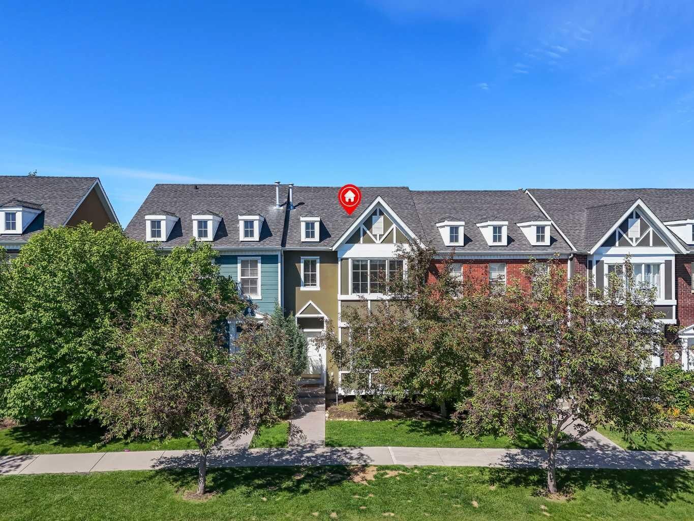 Property Photo: 304 Rainbow Falls Drive AB T1X 0E4