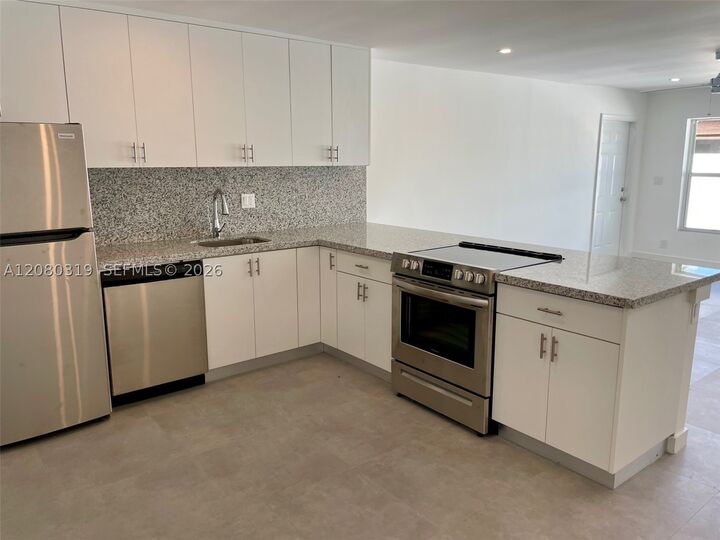 Property Photo:  5711 NW 28th St 5711  FL 33313 