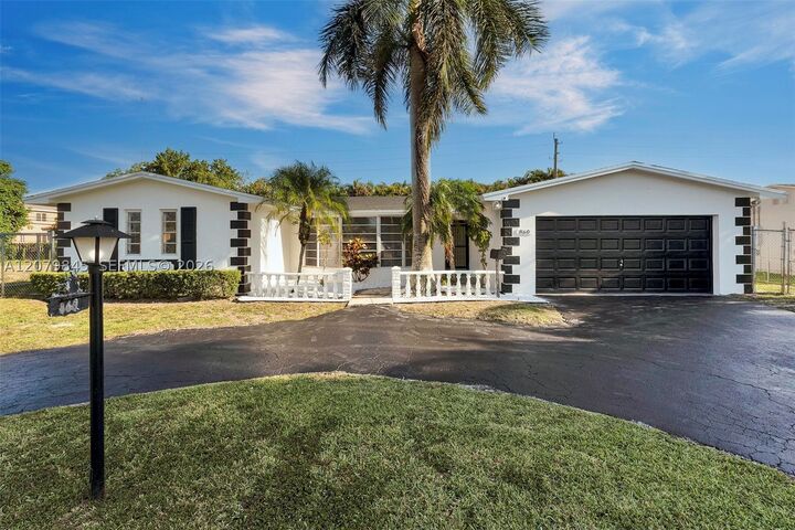 Property Photo: 860 NW 207th St FL 33169