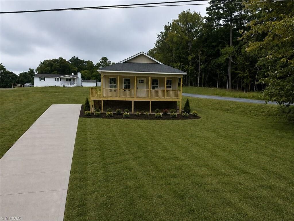 Property Photo:  5611 Rockford Drive  NC 27370 