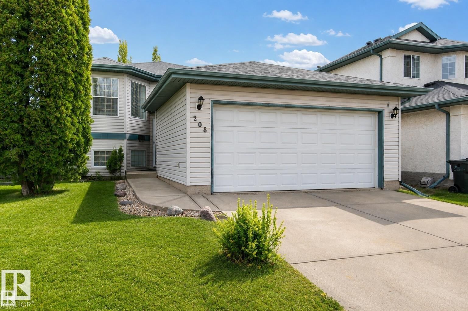 Property Photo:  208 Rainbow Crescent  AB T8A 5W6 