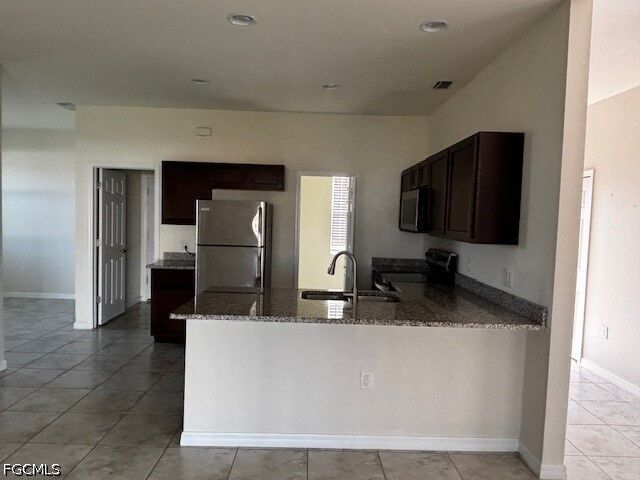 Property Photo: 211 NW 28th Street FL 33993