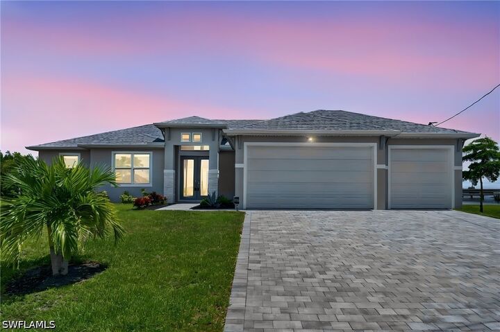 Property Photo: 913 NW 33rd Place FL 33993