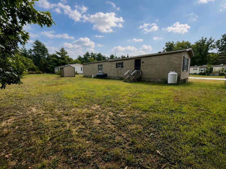 Property Photo: 15 Village Drive NH 03077