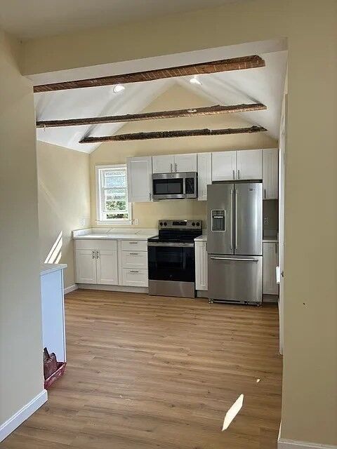 Property Photo:  1 Pond Place 1  MA 02038 