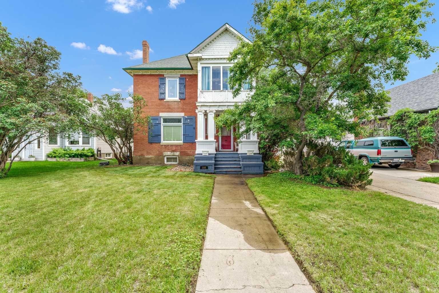 Property Photo:  335 1 Street SE  AB T1A 0A5 