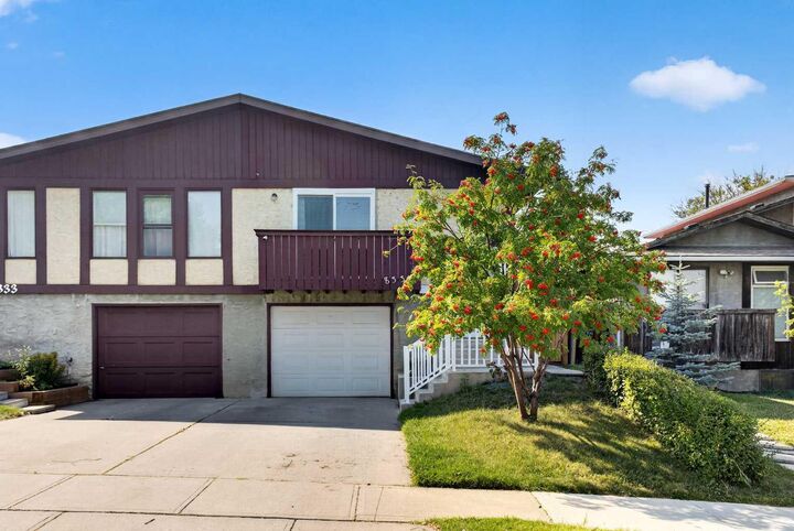 Property Photo:  8335 Centre Street NW  AB T3K 1J6 