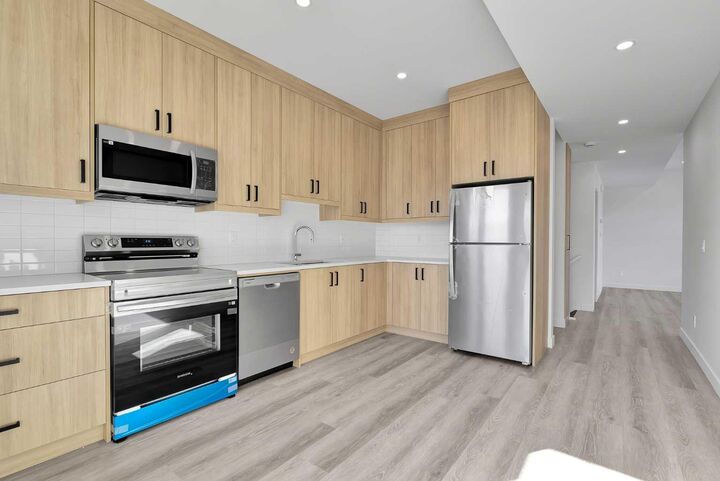 Property Photo:  4905 Bowness Road NW  AB T3B 1H1 