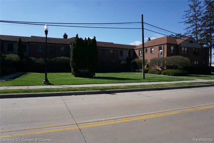 Property Photo:  22671 Garrison Street 107  MI 48124 