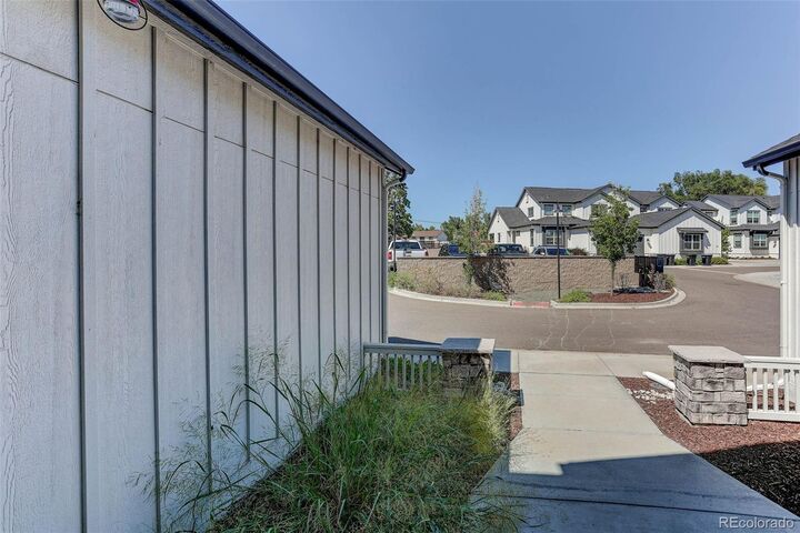 Property Photo: 6780 W 60th Avenue E2 CO 80003