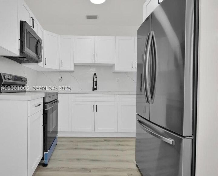 Property Photo:  10720 SW 147th St  FL 33176 