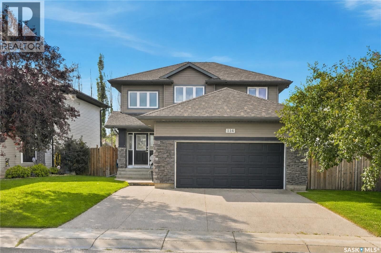 Property Photo: 114 Levalley Cove SK S7T 0H5
