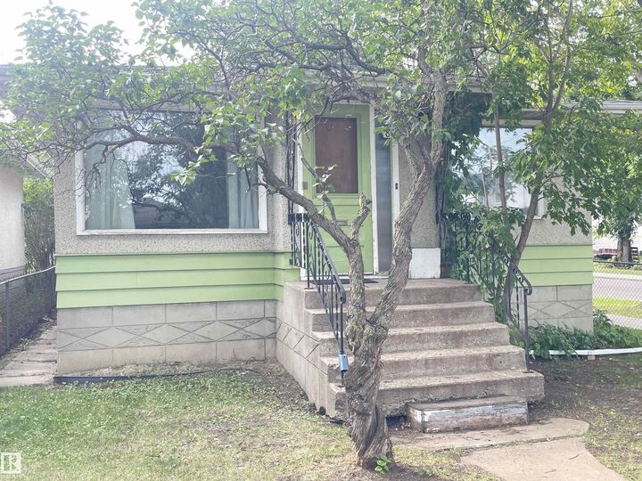 Property Photo:  8759 81 Avenue NW  AB T6C 0W5 