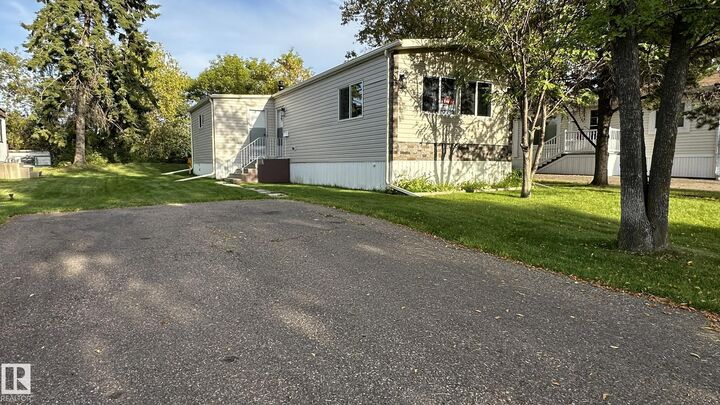 Property Photo: 44 Rim Road NW AB T6P 1G7