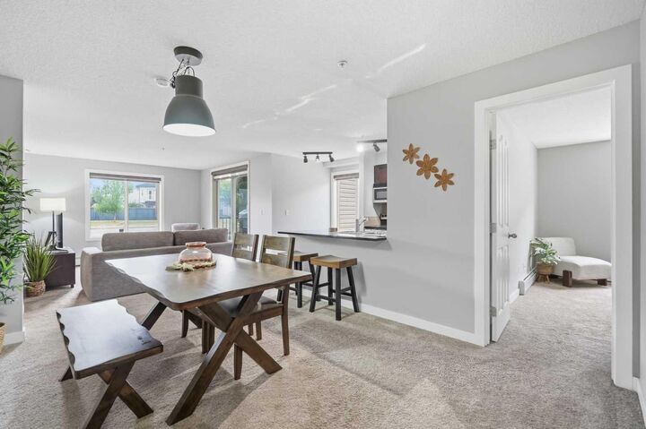 Property Photo:  403 Mackenzie Way SW 4101  AB T4B 3V7 