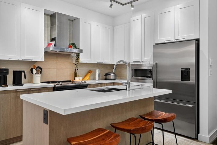 Property Photo: 611 Regan Avenue 103 BC V3J 3A3