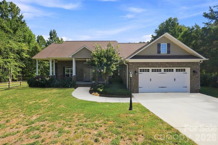 Property Photo:  122 Idlewild Road  NC 27006 