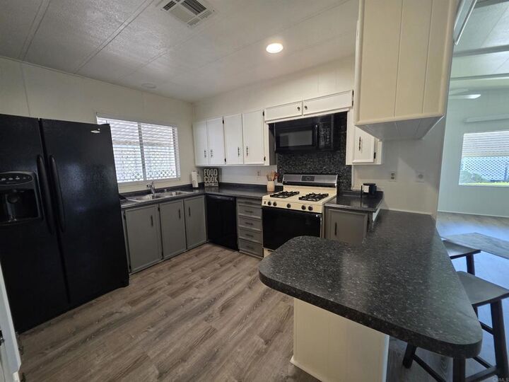 Property Photo:  1212 H Street 156  CA 92065 