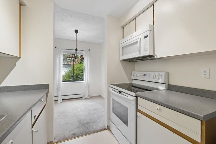 Property Photo: 1177 Howie Avenue 203 BC V3J 1T9