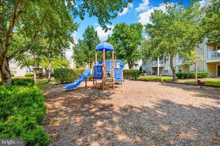 Property Photo:  14407 Hampshire Hall Court G-1004  MD 20772 