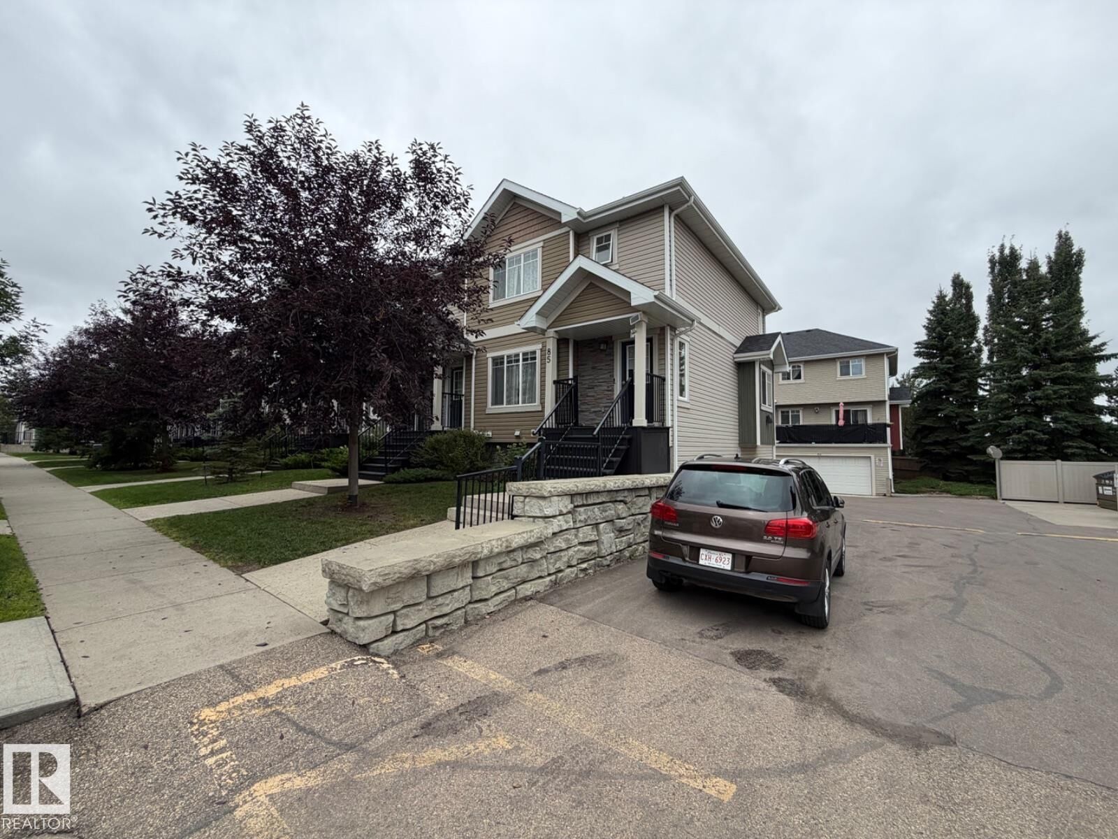 Property Photo:  9535 217 Street NW 85  AB T5T 4P5 