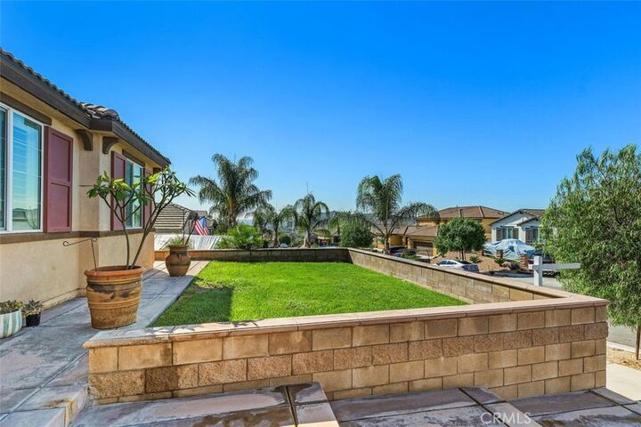 Property Photo:  7066 Almandine  CA 92509 
