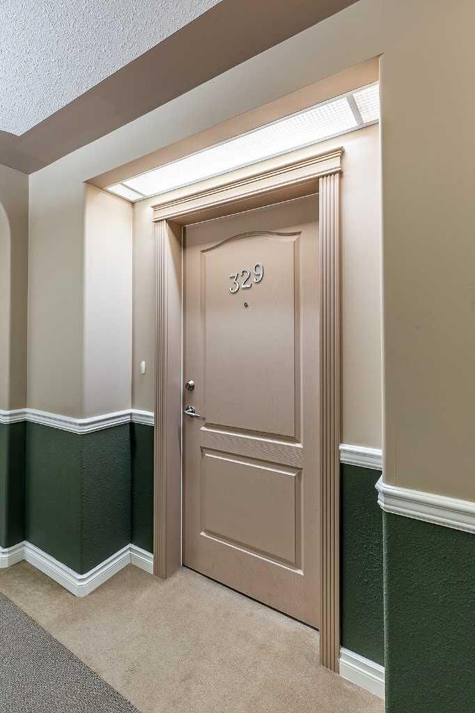 Property Photo:  201 River Ridge Drive NW 329  AB T1A 8V5 